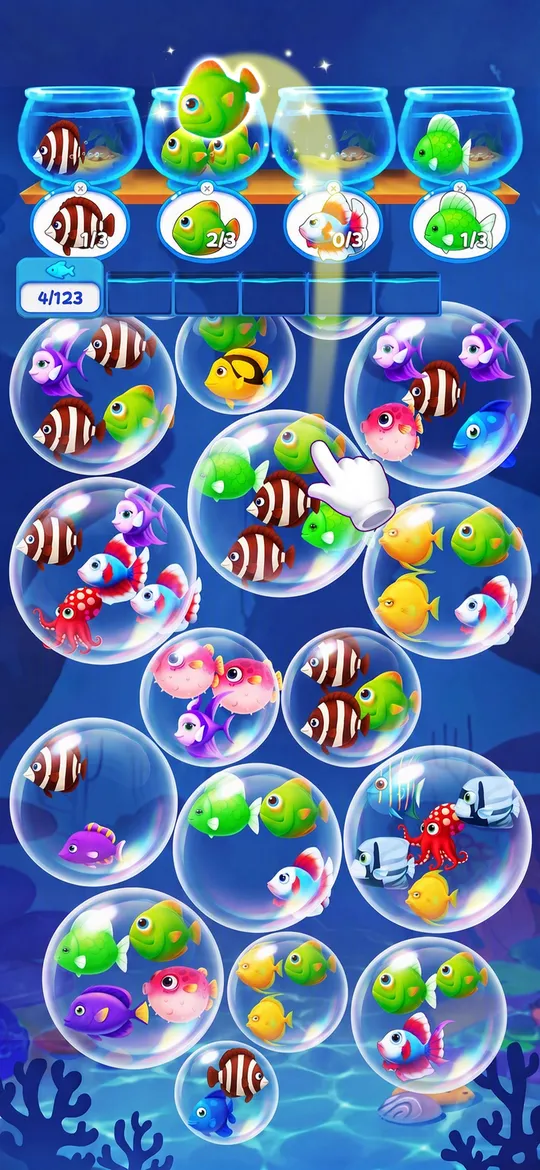 Bubble Jam: tapping a fish in a bubble